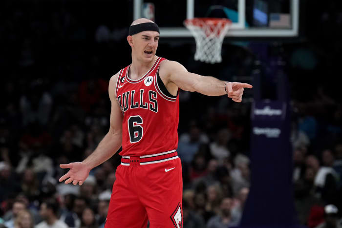 Mar 31, 2023; Charlotte, North Carolina, USA; Chicago Bulls guard Alex Caruso (6) reacts to a call in the first half against the Charlotte Hornets